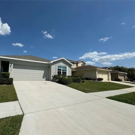 Rent this 4 bed house on 2001 Breton Ridge Way in Polk County, FL 33884