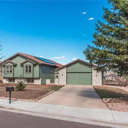 Buy this 5 bed house on 880 Pebblewood Drive in Colorado Springs, CO 80919