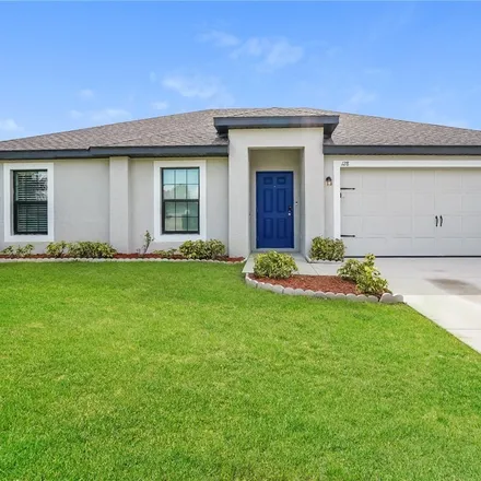 Rent this 3 bed house on 128 Shadow Lakes Drive in Lehigh Acres, FL 33974