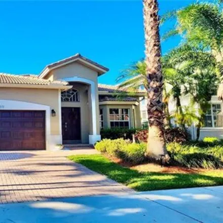 Rent this 4 bed house on 16519 Ruby Lake in Weston, FL 33331