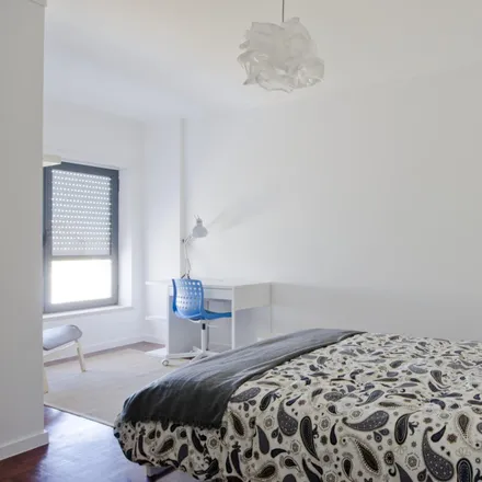 Rent this 3 bed room on Avenida João Paulo II in 1950-157 Lisbon, Portugal