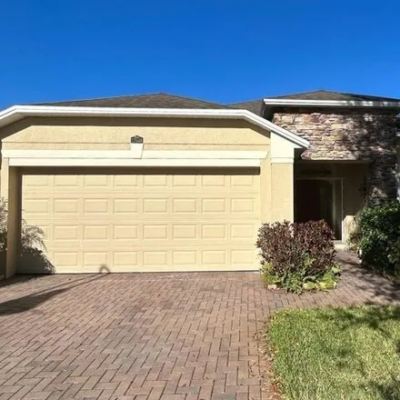 Rent this 4 bed house on 12622 Iris Lake Drive in Orange County, FL 32824