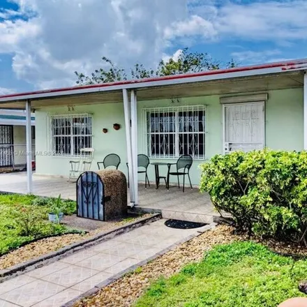 Rent this 2 bed house on 1220 East 10th Avenue in Sun-Tan Village, Hialeah