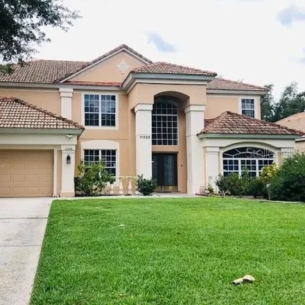 Rent this 5 bed house on 11340 Ledgement Lane in Orange County, FL 34786