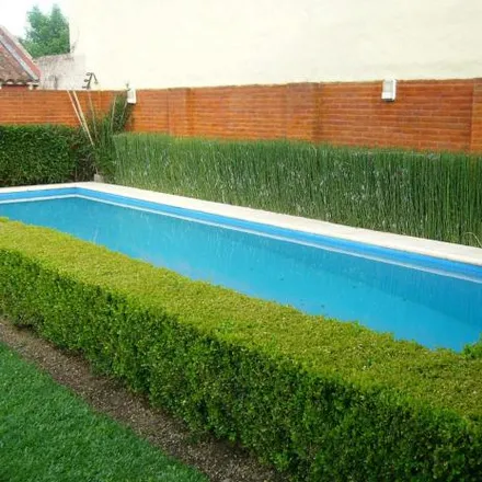 Buy this 3 bed house on Salvador Rosich in B1854 BBB Burzaco, Argentina