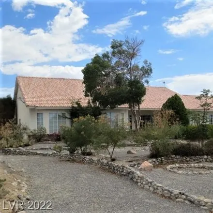 Buy this 3 bed house on 3021 Unicorn Avenue in Pahrump, NV 89048