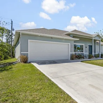Image 2 - 895 Starland Street Southeast, Palm Bay, FL 32909, USA - House for sale