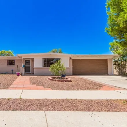 Buy this 4 bed house on East Palm Tree Drive in Tucson, AZ 85748