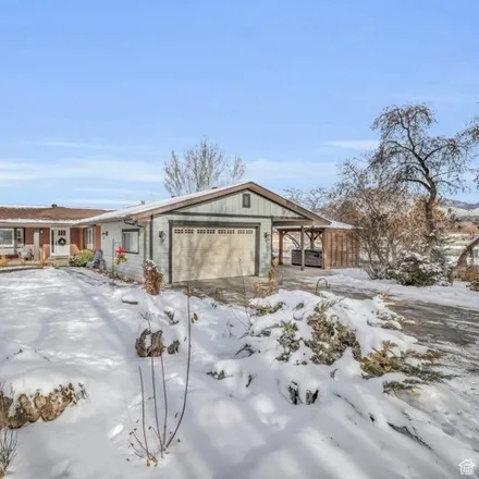 Buy this 6 bed house on 1483 Elm Leaf Cove in Millcreek, UT 84117