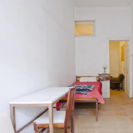 Rent this 7 bed room on Rua Gonçalves Crespo in 1150-105 Lisbon, Portugal