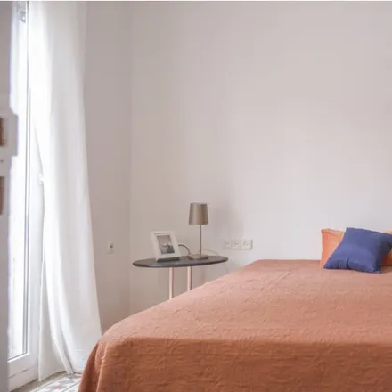 Rent this 2 bed room on Calle Robles in 13, 28053 Madrid