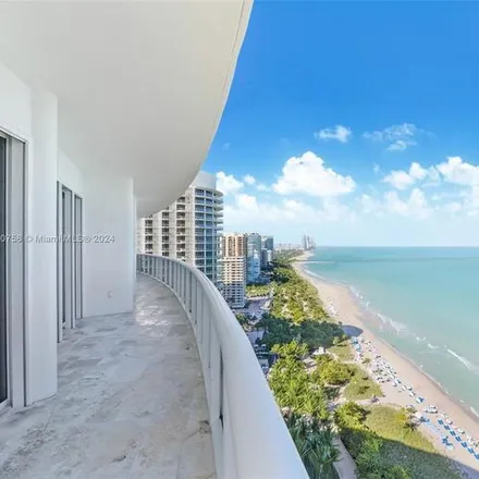 Rent this 4 bed condo on 9601 Collins Ave