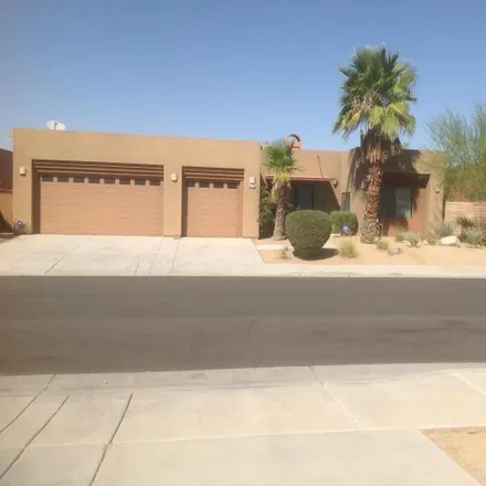 Rent this 4 bed house on 74130 Pele Place in Palm Desert, CA 92211