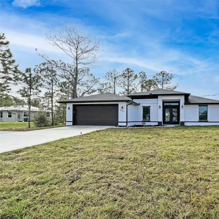 Buy this 5 bed house on 7898 15th Pl in Hendry County, FL 33935