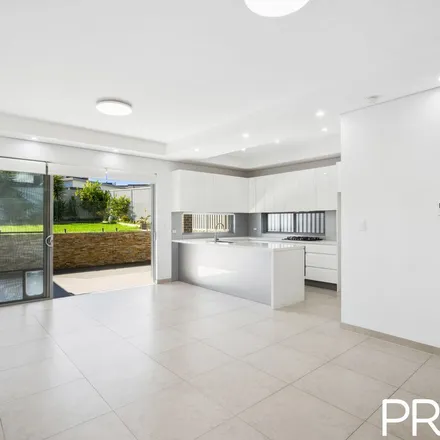 Rent this 4 bed apartment on 65 Sandakan Road in Revesby Heights NSW 2212, Australia
