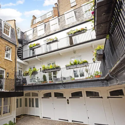 Buy this 3 bed townhouse on 1-17 De Vere Mews in London, W8 5AJ