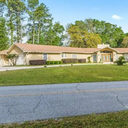 Buy this 4 bed house on 272 Northwest Fairway Drive in Lake City, FL 32055