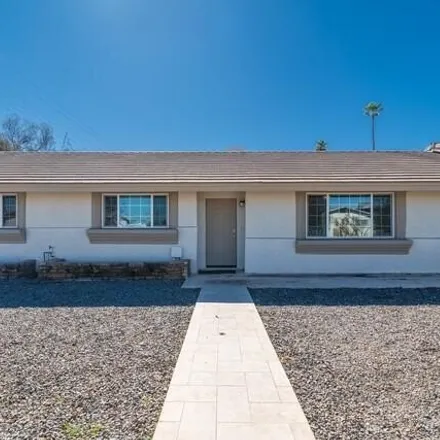 Buy this 4 bed house on 1127 East 8th Avenue in Mesa, AZ 85204
