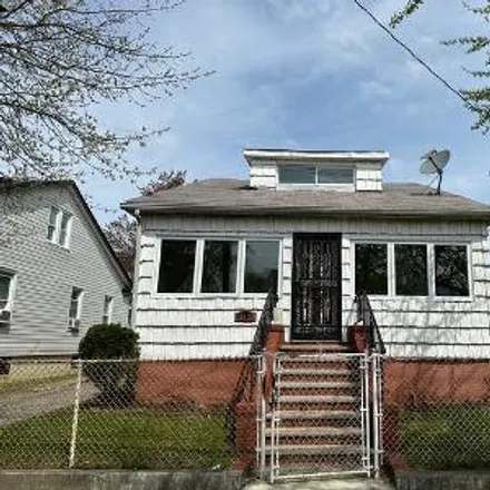 Buy this 3 bed house on 153-12 122nd Avenue in New York, NY 11434