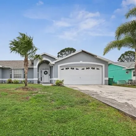 Buy this 4 bed house on 461 Southwest Eyerly Avenue in Port Saint Lucie, FL 34983