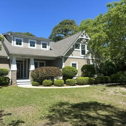 Buy this 4 bed house on 7647 Lost Tree Road in New Hanover County, NC 28411
