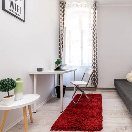 Rent this 4 bed room on Stanisława Wyspiańskiego 19 in 60-750 Poznań, Poland