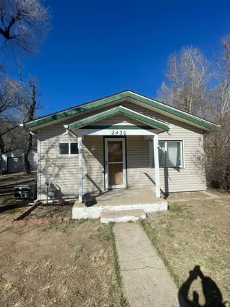 Rent this 1 bed house on 2430 E Monument St.