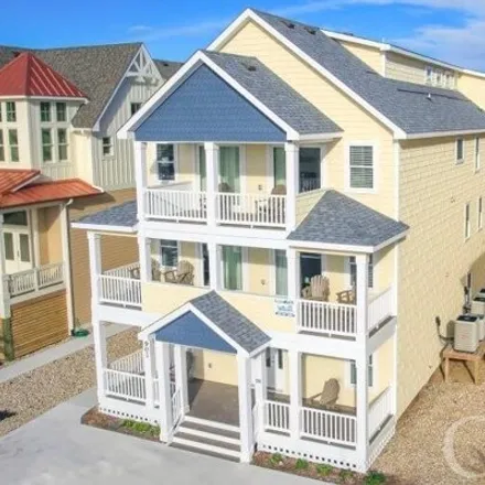 Buy this 15 bed house on Ocean House Motel in South Virginia Dare Trail, Kill Devil Hills