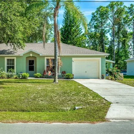 Buy this 3 bed house on 464 Reading Street Southeast in Palm Bay, FL 32909