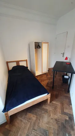 Rent this 7 bed room on Rua José Estevão 24 in 1150-200 Lisbon, Portugal