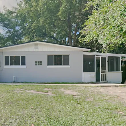 Buy this 4 bed house on 6986 South Miss Muffett Lane in Sweetwater, Jacksonville