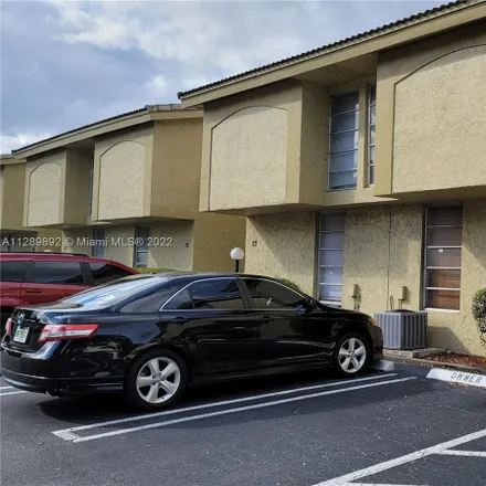 Rent this 2 bed townhouse on 8401 West Sample Road in Coral Springs, FL 33065