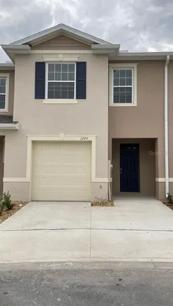 Rent this 3 bed townhouse on Tanager Street in Highlands County, FL