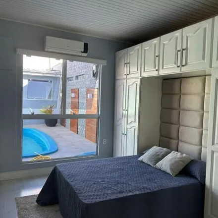 Buy this 3 bed house on Escola Municipal de 1º Grau Ladislau De Oliveira Nunes in Rua Getúlio Vargas, Vila Natal