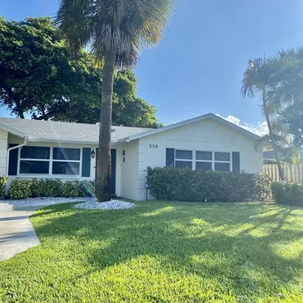 Rent this 3 bed house on 568 Ivy Avenue in North Palm Beach, FL 33410