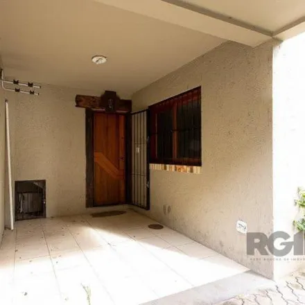 Buy this 2 bed house on Rua Oiampi in Guarujá, Porto Alegre - RS