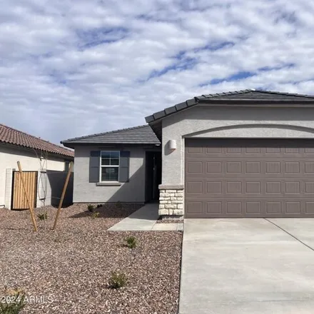 Rent this 3 bed house on 12043 East Verbina Lane in Pinal County, AZ 85132