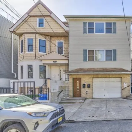 Rent this 3 bed house on 19 Fulton Avenue in Greenville, Jersey City