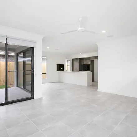 Rent this 4 bed apartment on Domonique Way in Flinders View QLD 4305, Australia