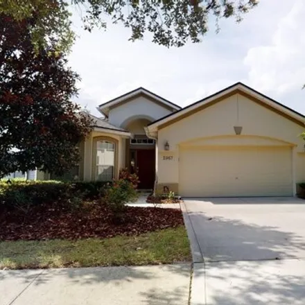 Rent this 4 bed house on 5967 Wind Cave Lane in Jacksonville, FL 32258