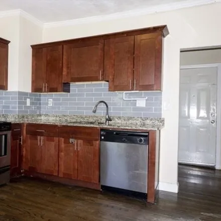 Rent this 4 bed apartment on 3106 Washington Street in Boston, MA 02119