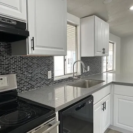 Buy this studio apartment on West Lincoln Street in Peoria, AZ 85345