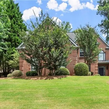 Buy this 5 bed house on 3893 Lake Edge Dr in Suwanee, Georgia