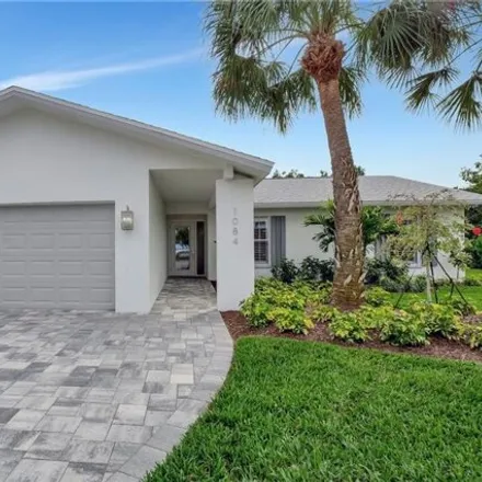 Buy this 3 bed house on 1198 Lakeshore Court in Collier County, FL 34103