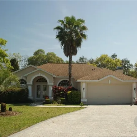 Buy this 4 bed house on 11498 Emerald Ridge Court in Spring Hill, FL 34609