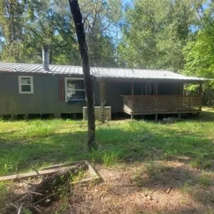 Buy this studio apartment on 12126 Northeast 106th Court in Levy County, FL 32618