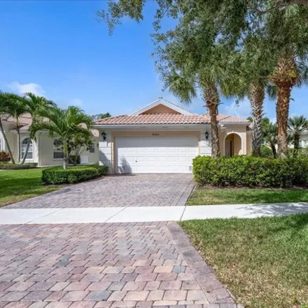Rent this 3 bed house on Villagewalk Circle in Wellington, Palm Beach County