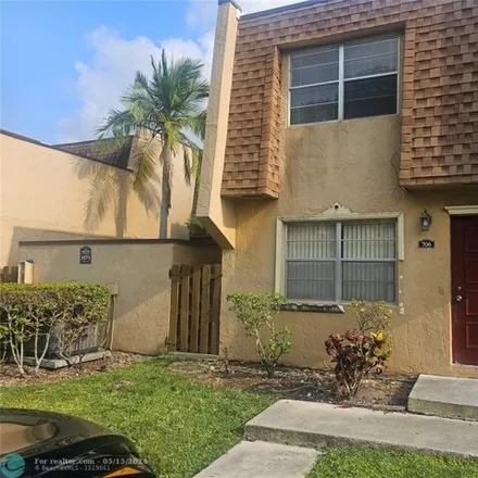 Rent this 4 bed townhouse on 3571 Nw 95th Ter Apt 706 in Sunrise, Florida