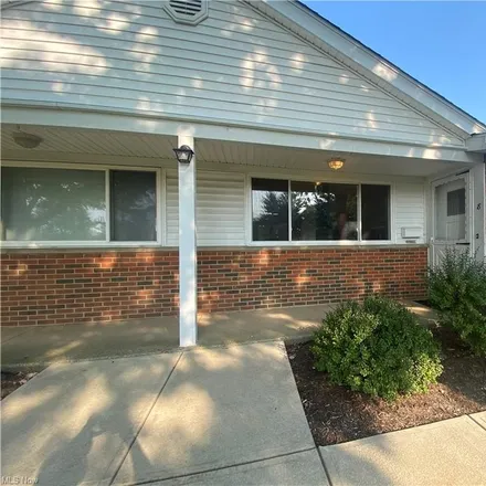 Buy this 2 bed townhouse on 25593 Country Club Boulevard in North Olmsted, OH 44070
