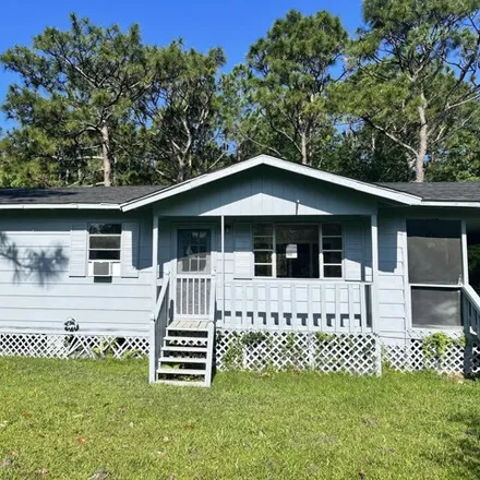 Rent this 3 bed house on 3011 Bucks Road in Gautier, MS 39553